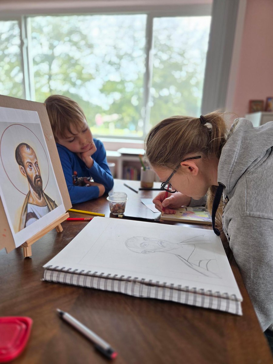 MystagogicalB's tweet image. Twyla, our eldest, turns 20 today! Here she is helping her little brother out with some lettering on the icon he drew.