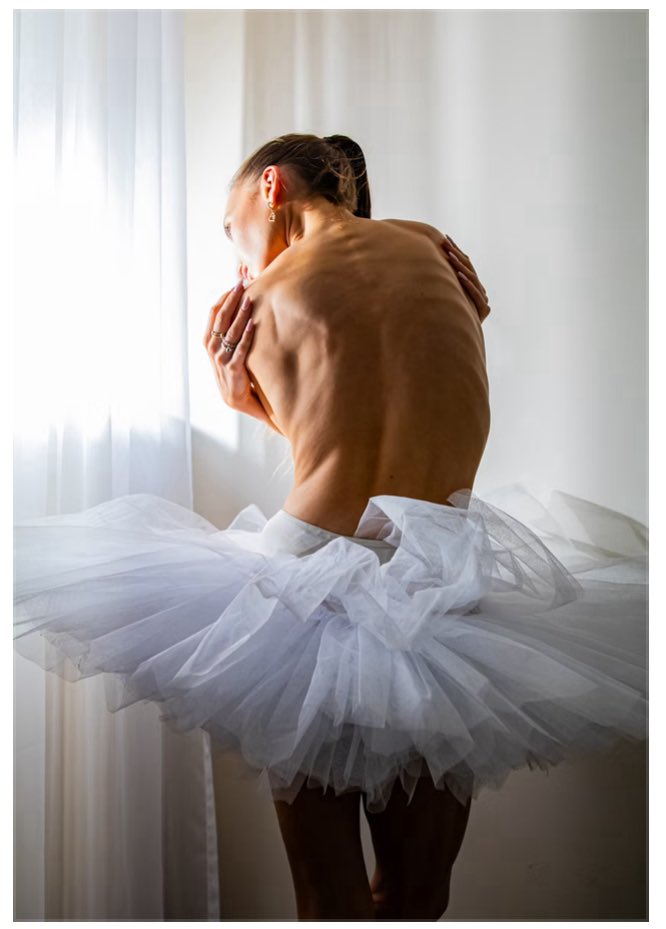 New work..
As they say photography is dead, I share with you all my new work “Fragile Grace”.

Fragile Grace
Bathed in soft natural light, a ballerina stands poised in delicate vulnerability. Her bare back, gently curved and adorned with shadows of strength and discipline,
