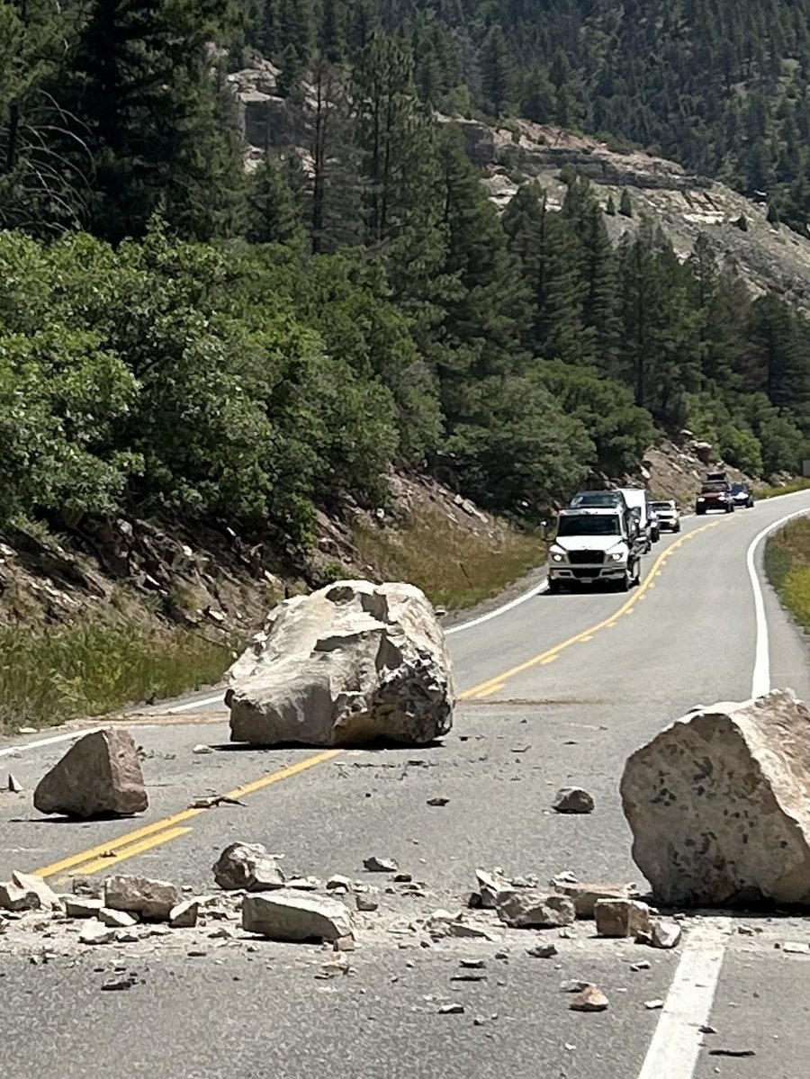 SheriffAlert's tweet image. Not kidding- there’s a large boulder the size of a small CAR in the center of Highway 145 mm 75.5. Deputies on scene directing alternating lanes of traffic. CDOT in route.