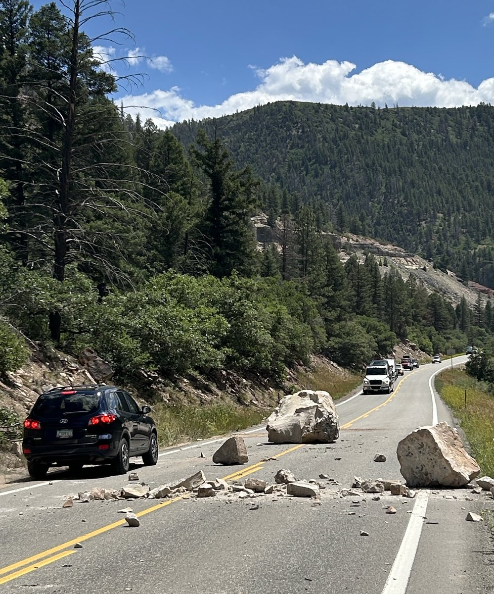SheriffAlert's tweet image. Not kidding- there’s a large boulder the size of a small CAR in the center of Highway 145 mm 75.5. Deputies on scene directing alternating lanes of traffic. CDOT in route.