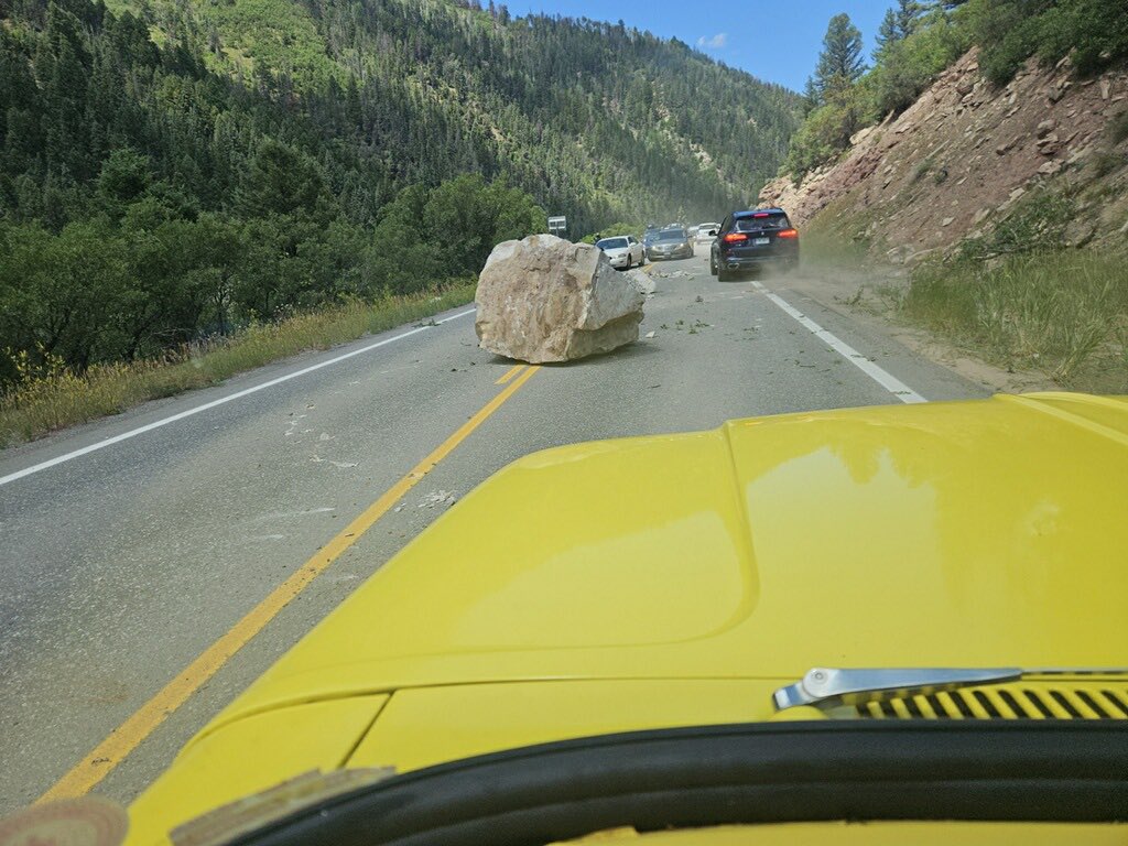 SheriffAlert's tweet image. Not kidding- there’s a large boulder the size of a small CAR in the center of Highway 145 mm 75.5. Deputies on scene directing alternating lanes of traffic. CDOT in route.