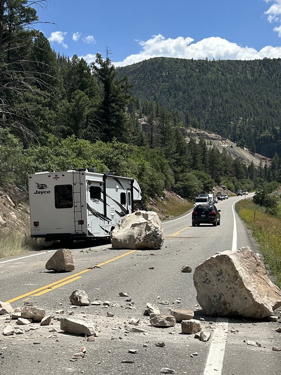 SheriffAlert's tweet image. Not kidding- there’s a large boulder the size of a small CAR in the center of Highway 145 mm 75.5. Deputies on scene directing alternating lanes of traffic. CDOT in route.