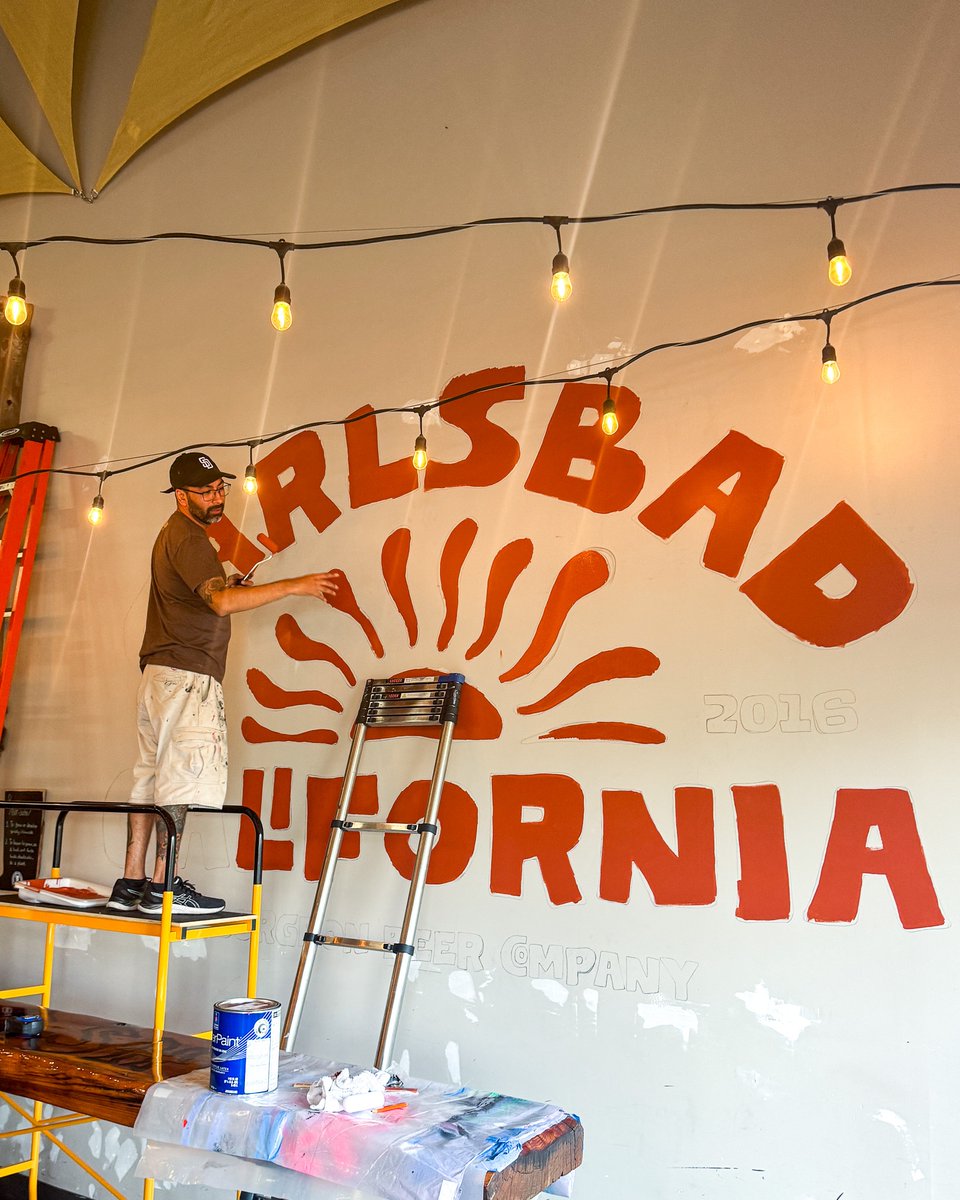 CHEERS CARLSBAD! 🌞🌊

Our HQ just got tagged with a fresh mural from our pal Jesse (you’ve seen his work at our other spots too), and it’s basically a giant “hell yeah” to the city that built us. Rooted in Carlsbad. Brewed for everywhere.