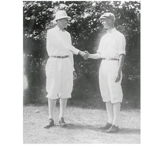100YearsAgoNews's tweet image. July 26, 1925: Francis Ouimet (left) is congratulated by Winthrop Hershey, whom he defeated to win his sixth Massachusetts state amateur golf championship.