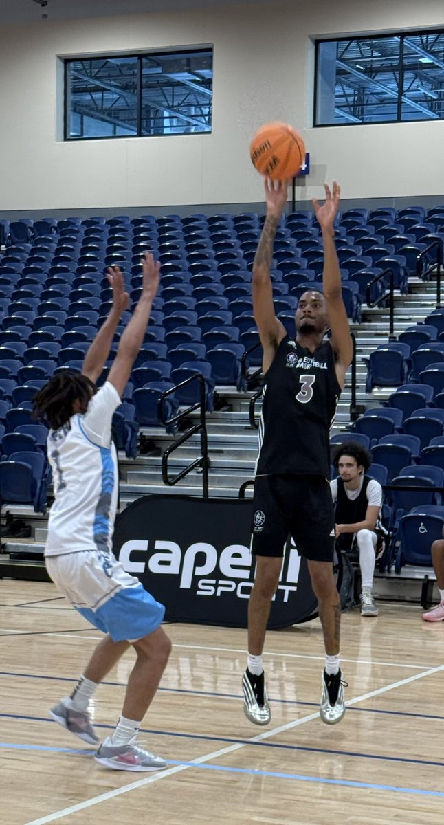 B Elite Select sharpshooter Faron Friend (6’4 2026 Glen Allen HS) hits the corner three pointer.  One of the states most feared shot makers and most highly sought available prospect.  He has interest from such schools as American, Elizabeth City, Concord, Randolph Macon, Virginia