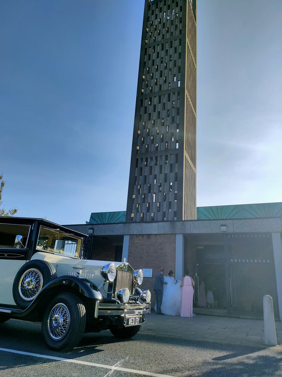 One of our Imperial Viscount Landaulette wedding cars waiting outside St Margaret Mary's in Huyton Knowsley #wedding #cars #liverpool #vintage #church #knowsley barringtonscars.co.uk