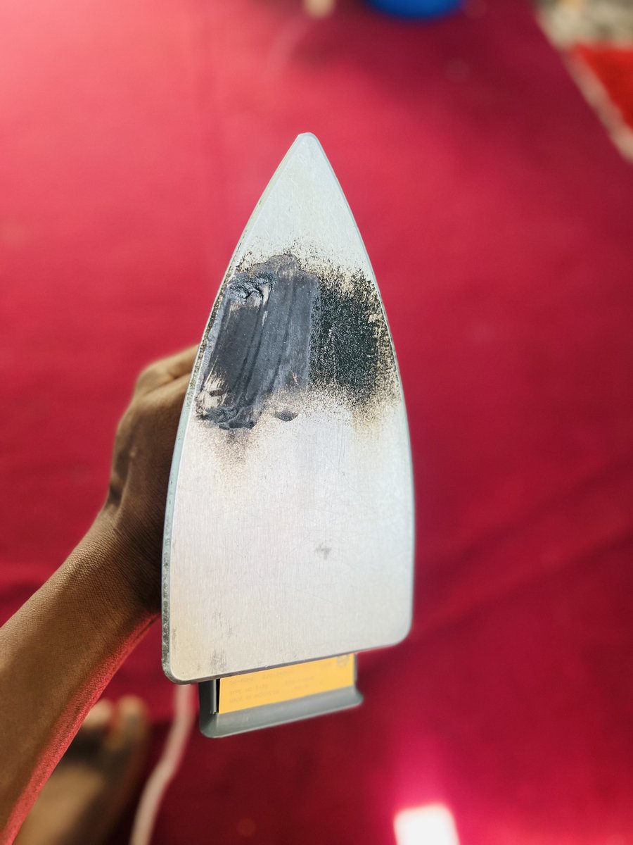 What is the right way of removing this black coating ?