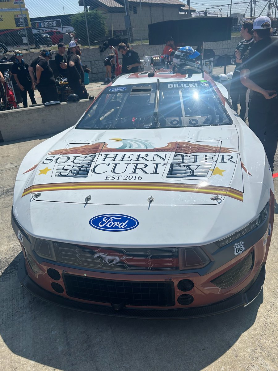 MBMMotorsports's tweet photo. Carl Long's operation goes Cup racing at The Glen for the first time today!

@joshbilicki pilots the Southern Tier Security #66 this afternoon at 2 pm ET on @USANetwork.

#NASCAR #GoBowlingAtTheGlen https://t.co/CEWPEwEH2s