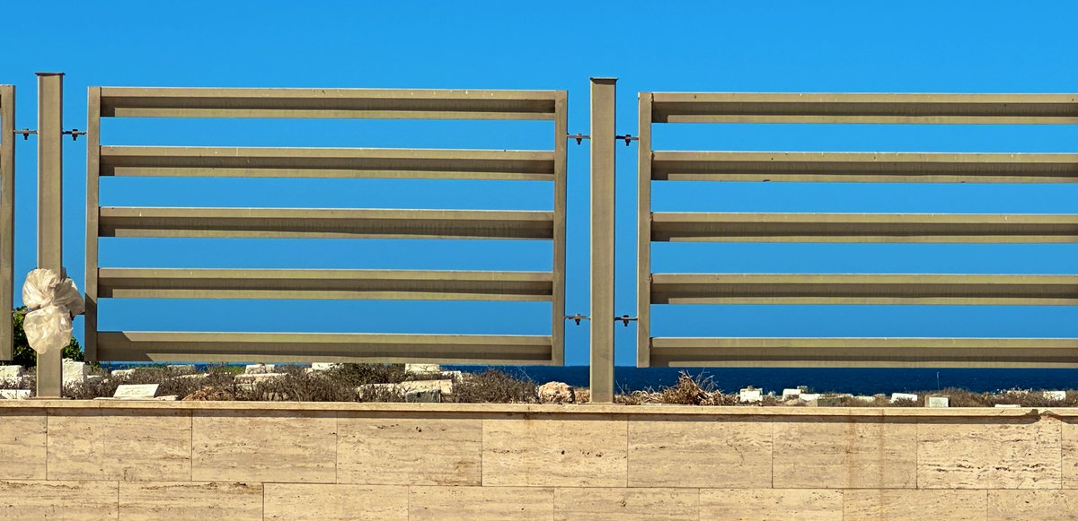 usually refill my tank at a quarter, with the current crisis,i had non. 
Spent my post-Friday prayers in a 1.2km gas queue,soaking in vitamin D, catching visions (a man marching with a Palestinian flag?), and gazing at the seaside tomb, wondering if a Cyrene end awaits.

#Libya