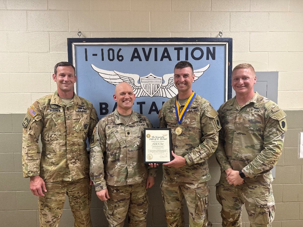 The Land of Lincoln Chapter of the Army Aviation Association of America (AAAA) bestowed the Order of Saint Michael upon Illinois Army National Guard Maj. Charles Auer. This recognizes Maj. Auer as one of Army Aviation’s best and marks a resurgence in chapter activity.