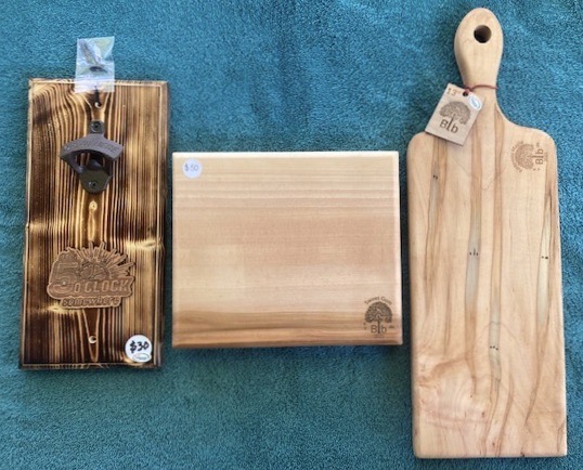 New products from our son John for the Saturday Aug. 9  La Grange Farmers' Market &amp; Artisans. It's 5 o'clock somewhere bottle opener, 11 1/2 x 5 inches with screws, 9 x 71/2- inch sweet gum cutting board with plastic feet, and a 17 1/2 x 6-inch maple cutting board.