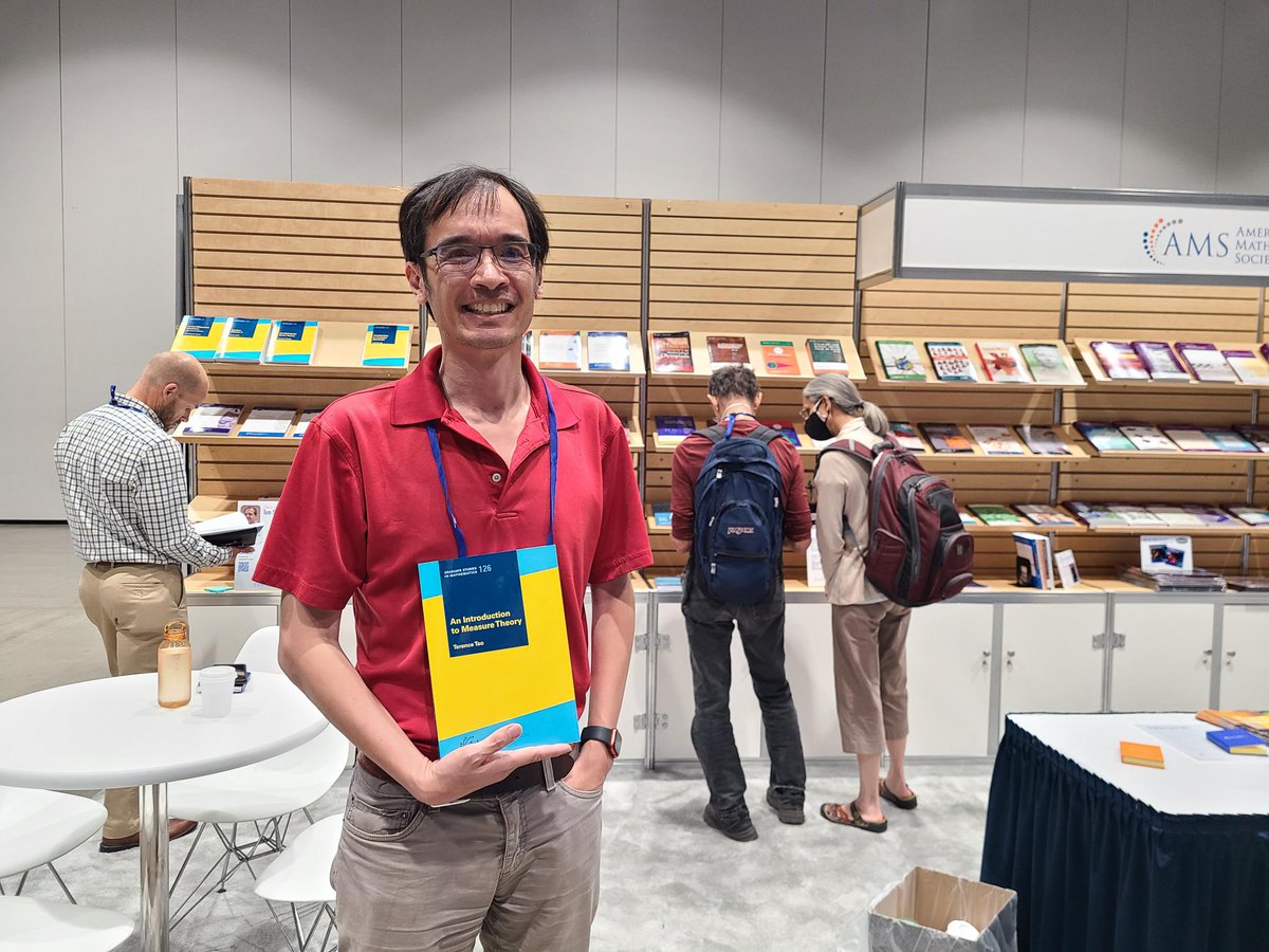 amermathsoc's tweet image. It was wonderful to catch up with Terence Tao at #MathFest, seen here with his book, An Introduction to Measure Theory.