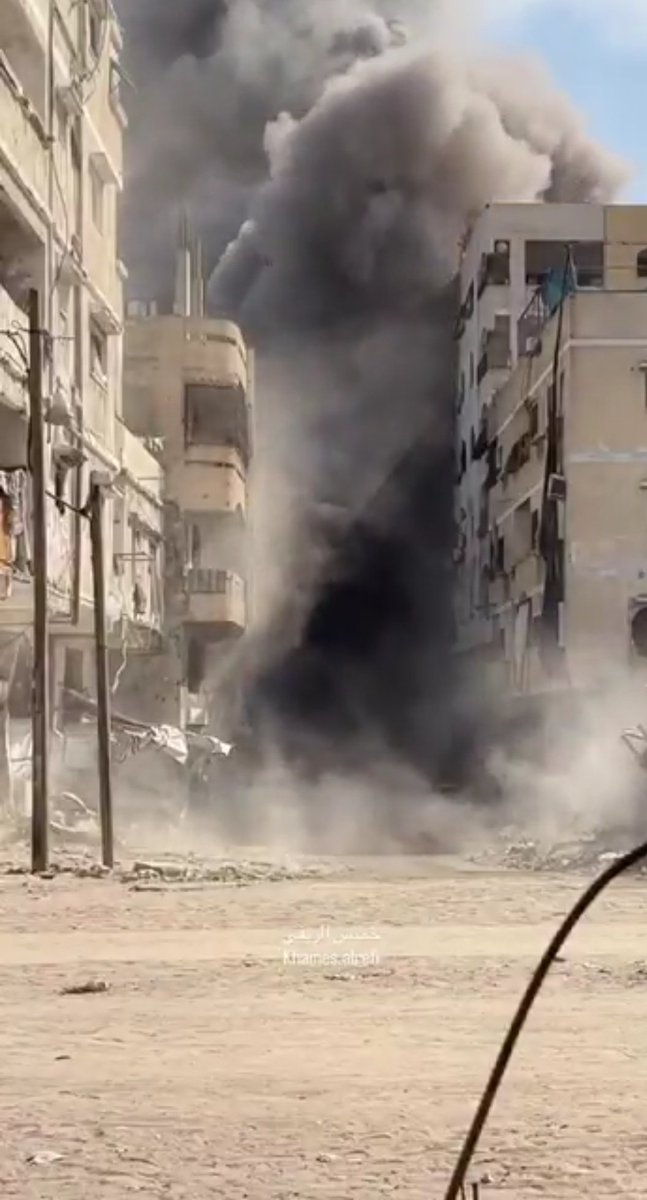 🔔A scene documenting the moment of the Israeli occupation's bombing of a residential building belonging to the kahil family near the Abbas intersection west of Gaza City