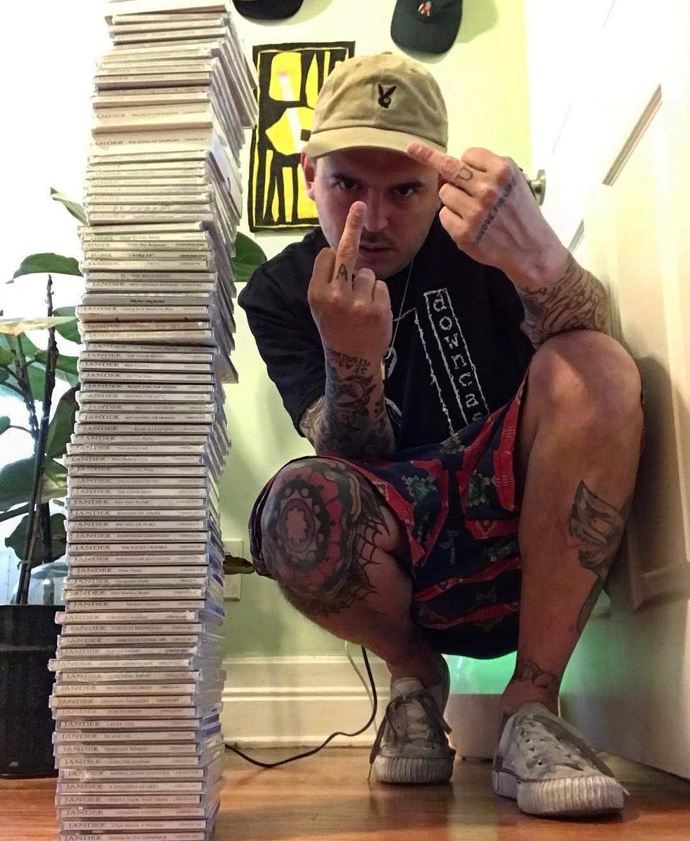 Lil Ugly Mane with his stack of Jandek CDs