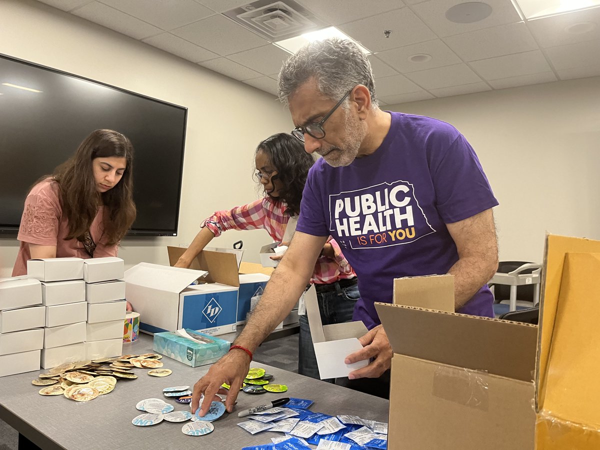 Dr. Ali Khan, Dean of <a href="/UNMCCOPH/">UNMC College of Public Health</a>, partners with our team to pack boxes of sexual health and wound care kits, which will be stocked in our Health Resources machine to serve the Douglas County community. #PublicHealthIsForYou