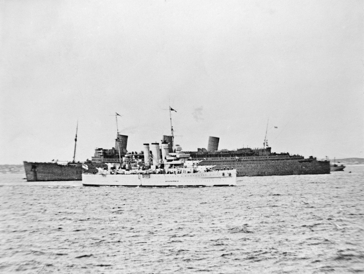 The cruiser HMAS Australia and the ocean liner RMS Queen Mary.