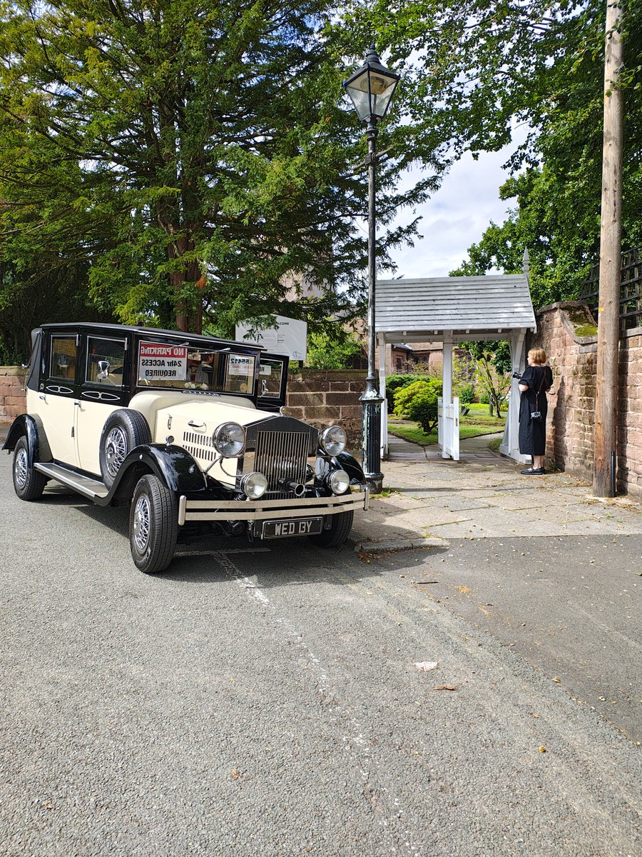 One of our Imperial Viscount Landaulette wedding cars waiting outside All Saints Church in Liverpool #wedding #cars #liverpool #vintage #allsaints #church  barringtonscars.co.uk