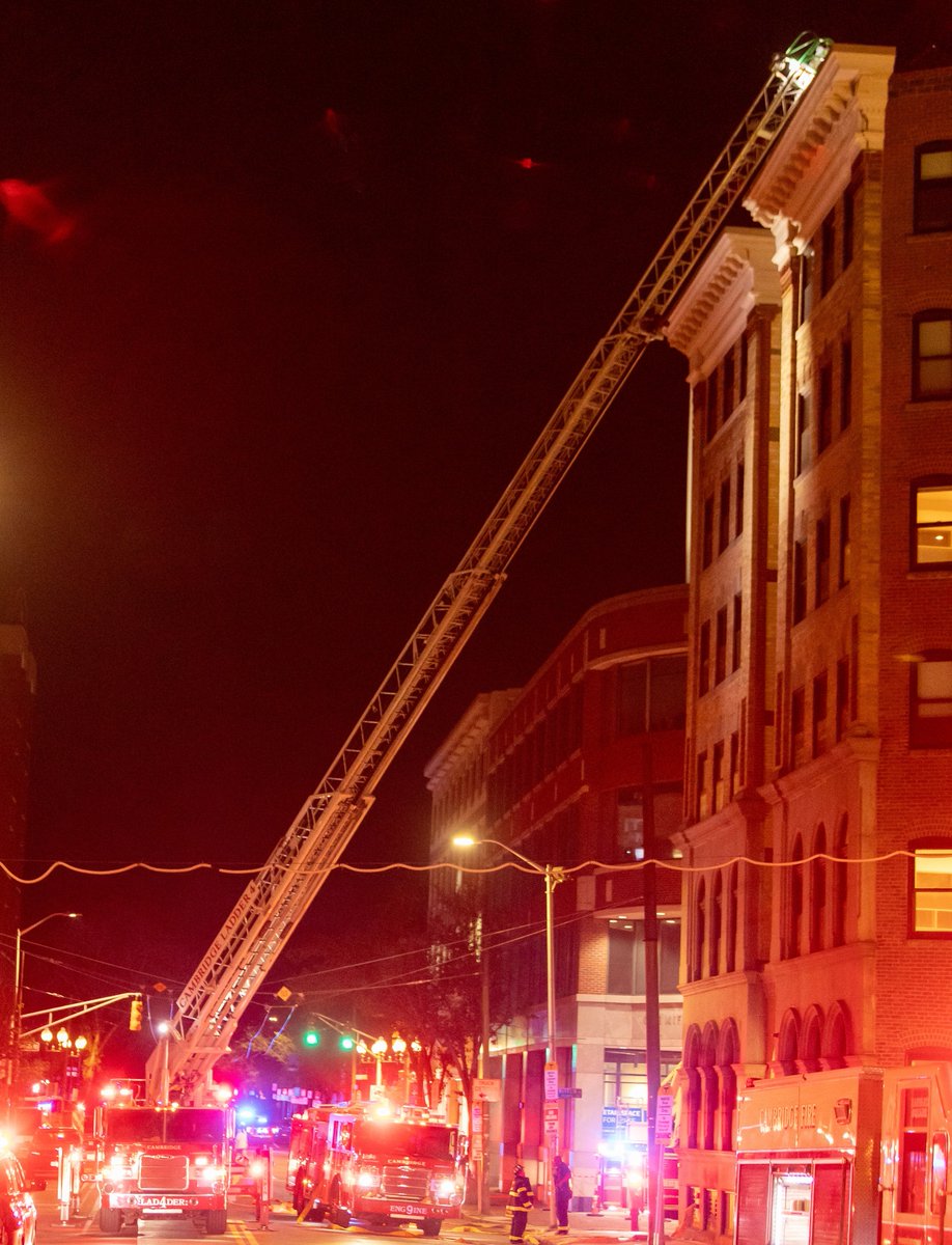 Obstructed raise! Note the skill of Ladder 4's operator threading the aerial device through the trackless-trolley wires to get the aerial deployed to the roof of the building. (The trolley wires are no longer in active use &amp; are reportedly de-energized).
Duty: Group 2