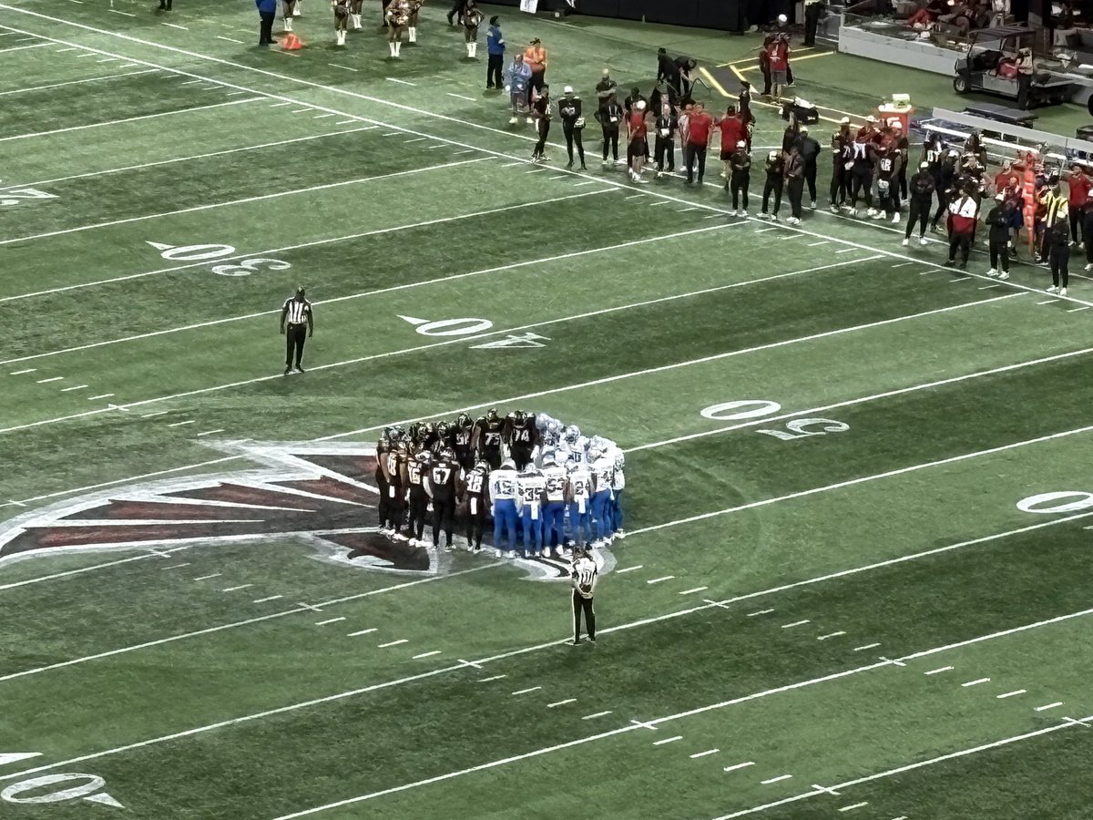The Falcons and Lions are huddling together at midfield. Both teams must have agreed to run out the clock after Lions safety Morice Norris left in an ambulance. Respect.