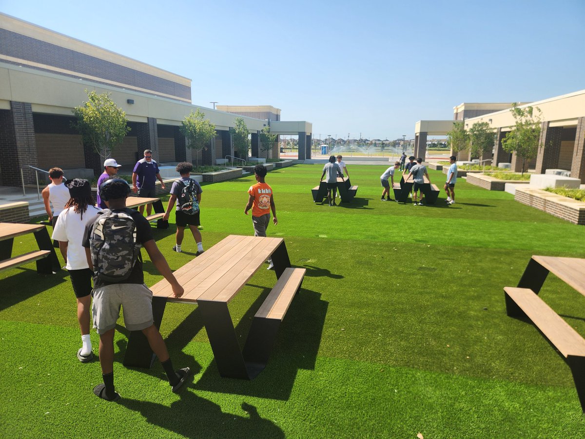 "Sweep the Sheds" looks like this 👇.  Triple digit heat, heavy tables and a last second dilemma was no problem for coaches, players and Mr. Newsome.  Thank you, <a href="/Richland_FB/">@RHSFootball</a> for reminding us that actions speak louder than words.   <a href="/KennethGilchr11/">Kenneth Gilchrist</a> #WeAreRichland <a href="/RHSProsper/">Richland High School</a>