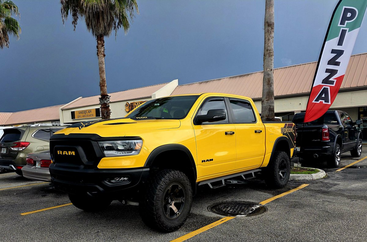 AutoHustler's tweet image. "When the storm rolls in, the Rebel stands out. 🌩️
Yellow paint. Blacked-out attitude. Zero apologies.

#RAMRebel #TruckLife #BuiltDifferent"