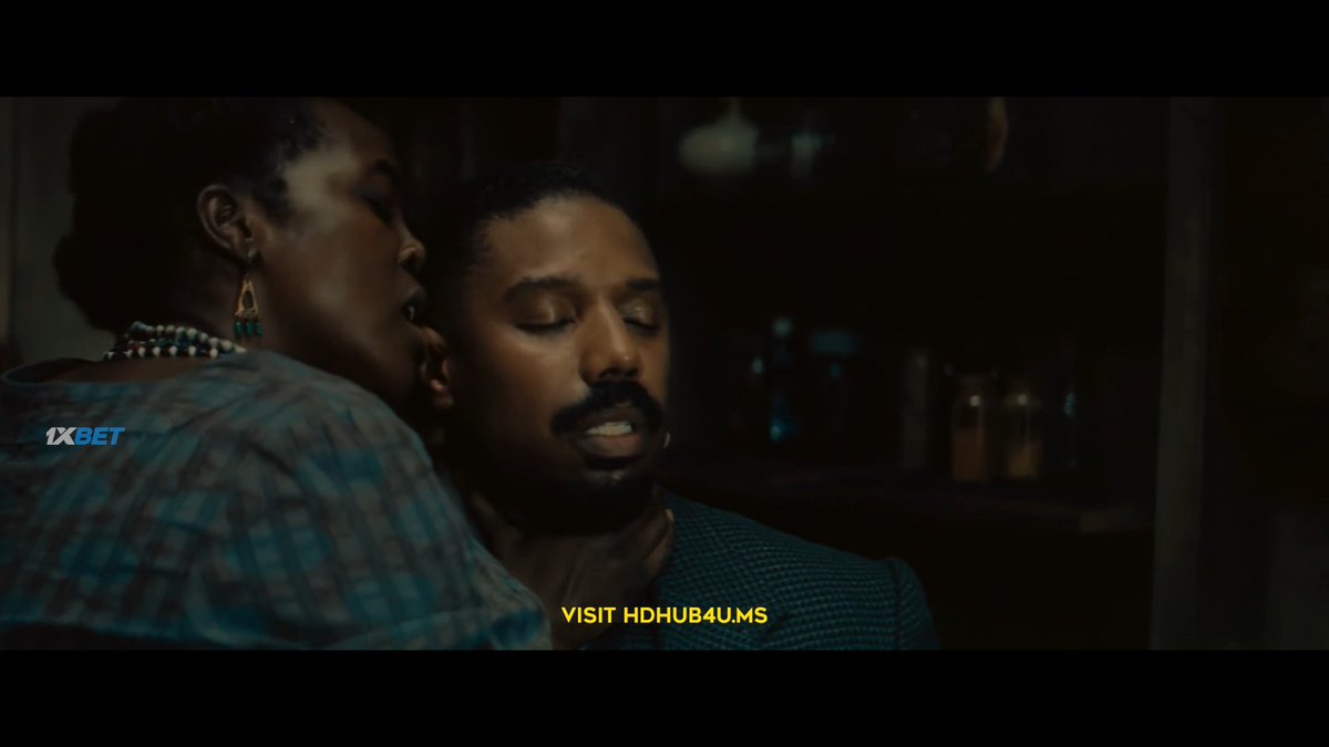 Watching Sinners as Ryan Coogler intended. On a scuffed laptop screen with Hindi subtitles and a Curaçaoan sports betting logo floating across the frame.