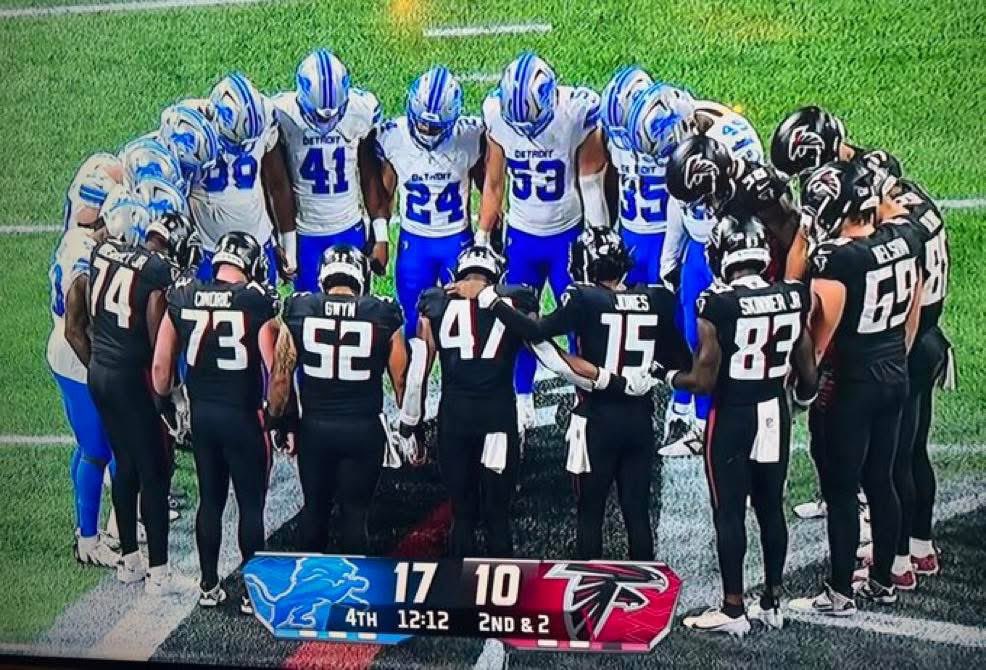 My God you hate to see this. A touching display of unity and understanding what is really important in the midst of tragedy. The two teams run out the entire fourth quarter clock, praying together in a circle in the middle of the field. #lions #OnePride