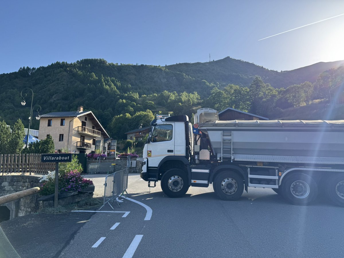Early morning preparations for the annual village fete - getting village oven ready, all ready for the slipper kicking competition and an effective road block in place