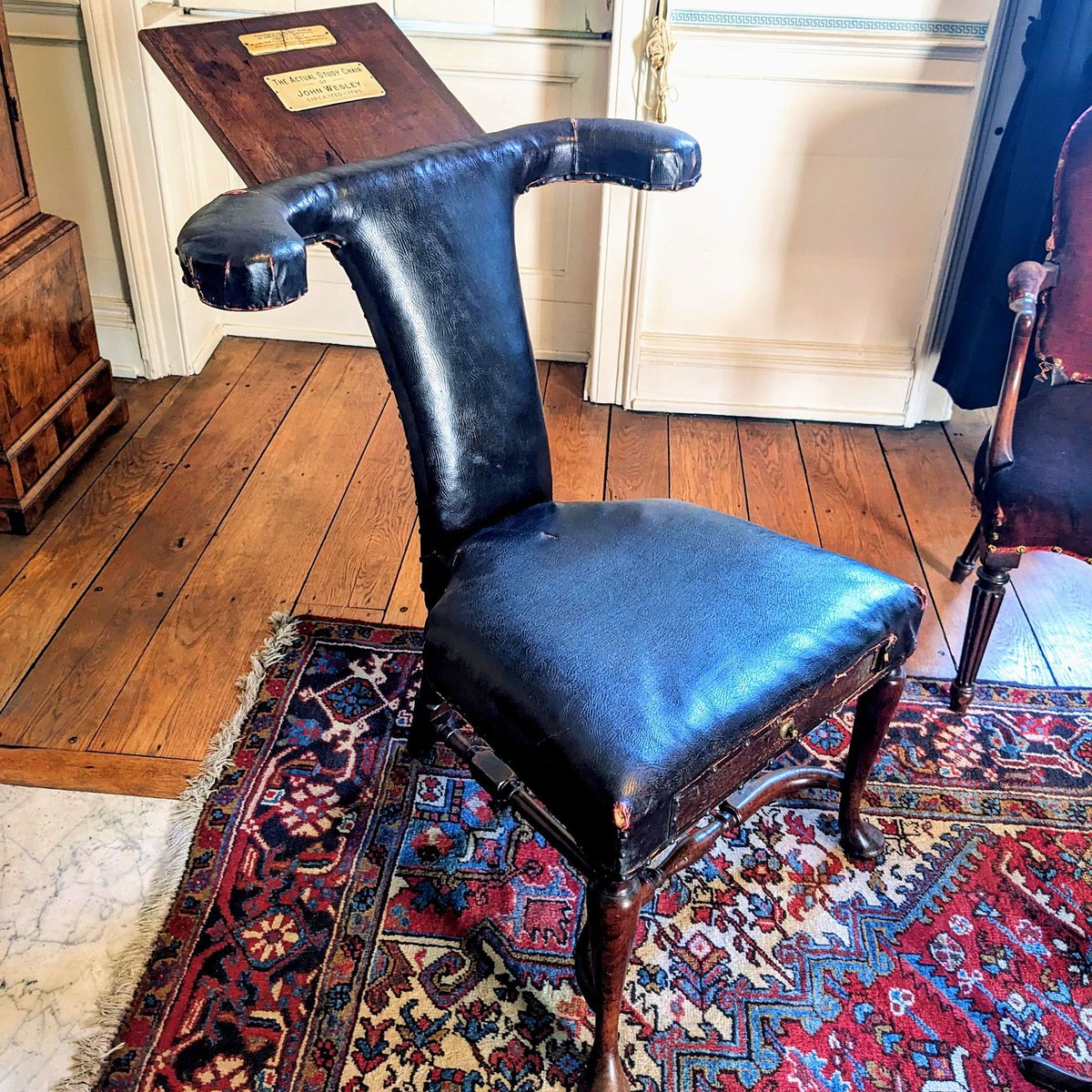 This chair in John Wesley's House has an unusual design, being usable by facing forwards or backwards, legs astride the backrest. It is known as a cockfighter chair, and is said to have been given to Wesley by a bookmaker influenced by him to mend his ways. #WesleysChapel #Chair