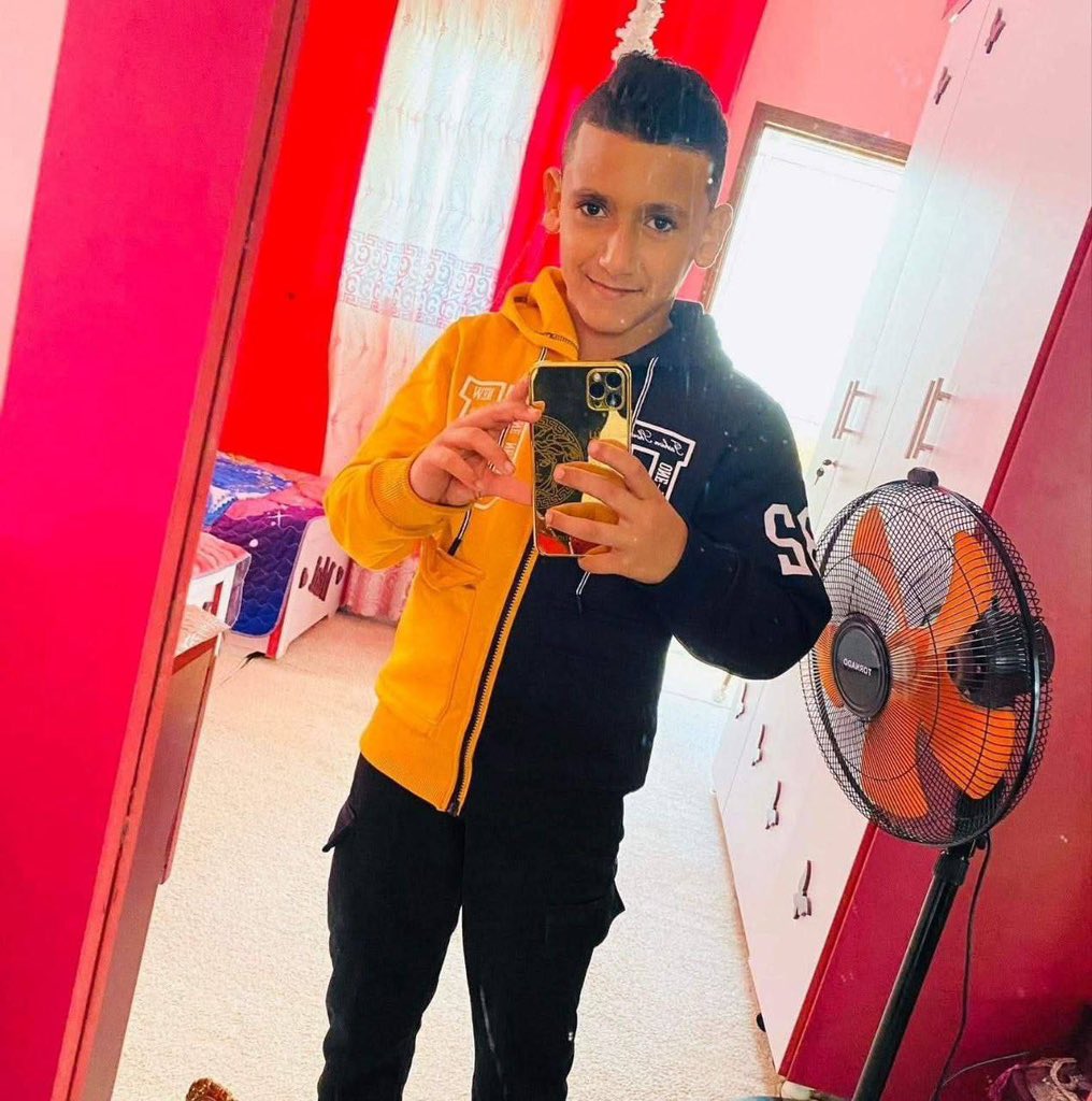The innocent child martyr, Muhannad Zakaria Eid, was taken from this world in a heartbreaking tragedy, a heavy box of aid fell directly on him during an airdrop west of Al-Nuseirat Camp in central Gaza, silencing a young life that deserved to see the future.