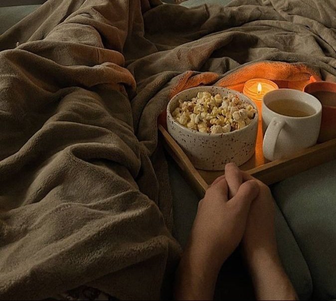 Wrapping up the night with a movie date and cuddle with some kisses.