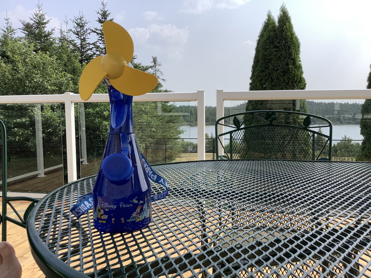 Sitting on the patio, sipping a Newfie Slush and listening to <a href="/975krock/">975krock</a> ! Cooling off with my Disney spray bottle with fan. Awesome Saturday!