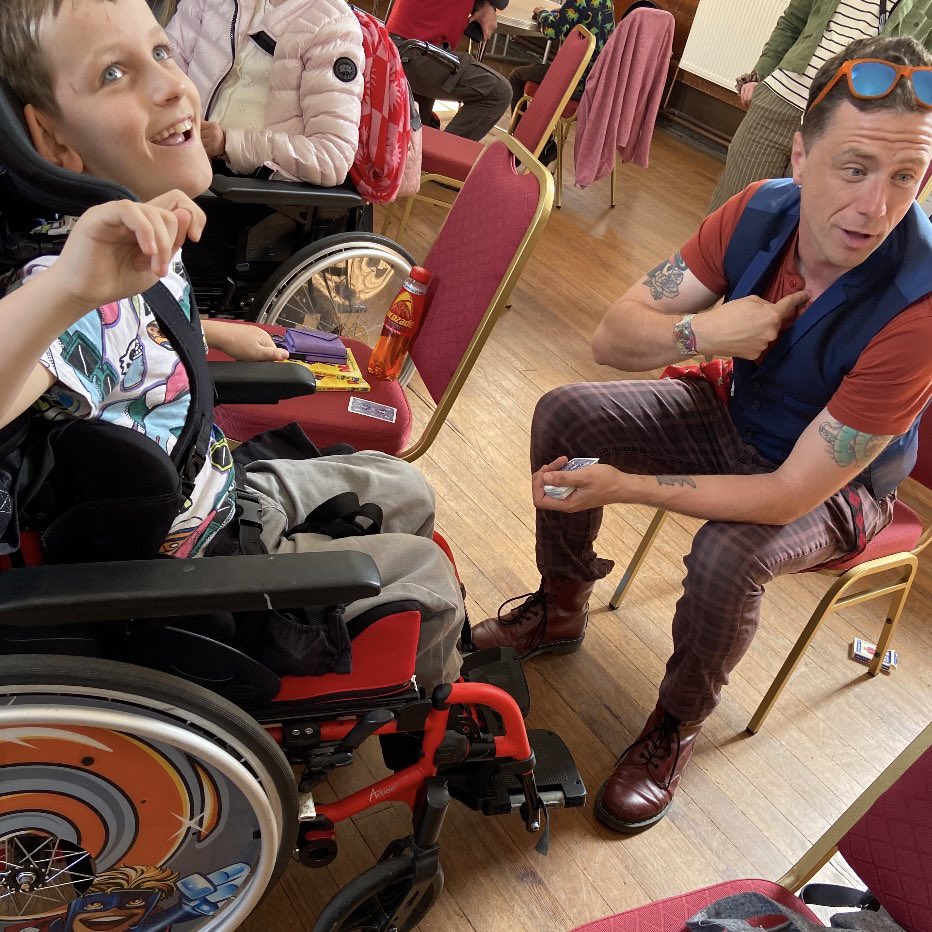 PAMIS_Scotland's tweet photo. What a fantastic day with George Webster at our @edbookfest fringe event in Walpole Hall! Huge thanks to @CareBreaks for funding, the festival for gifting books, James Lantern for the magic, and George Webster &amp; Tim Budgen for making it so special. https://t.co/MBhiCPJCV7