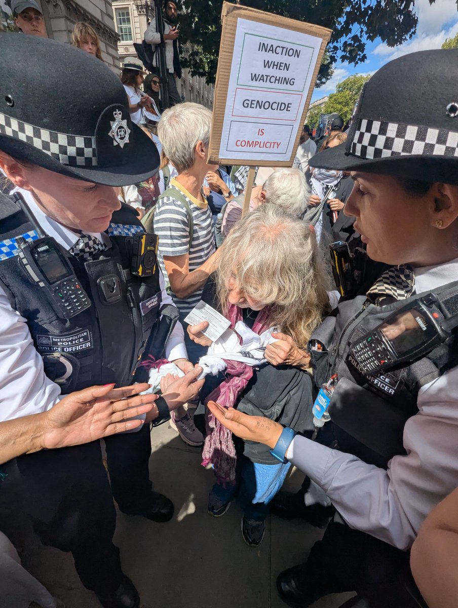 An 80 year-old woman being arrested on terrorism charges in London today. Disgraceful.