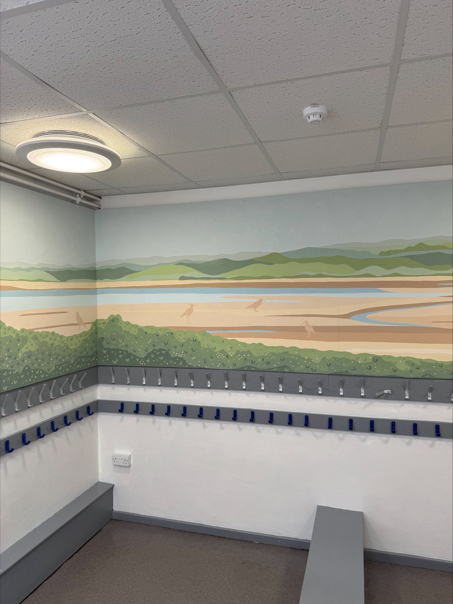 Huge thanks to Kate <a href="/paintpad/">Paint Pad Interiors</a> for our beautiful new KS1 cloakroom mural 🎨She’s brought Morecambe Bay to life with calming tones, local fells, and class bird silhouettes 🦅 Incredible work - our children (and staff!) will love it! #SchoolMural #MorecambeBay