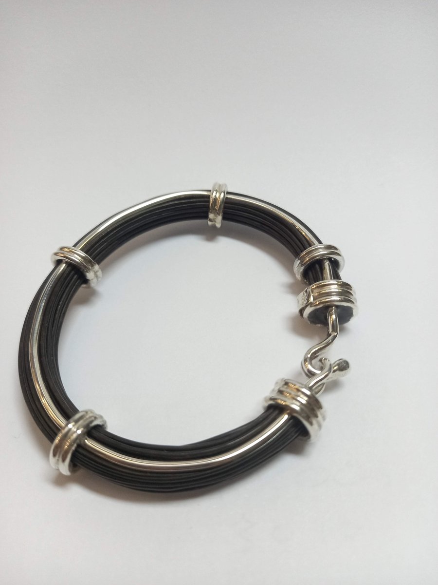 Silver garners 3-sided elephant hair bangle capediamondexchange.com/products/silve…