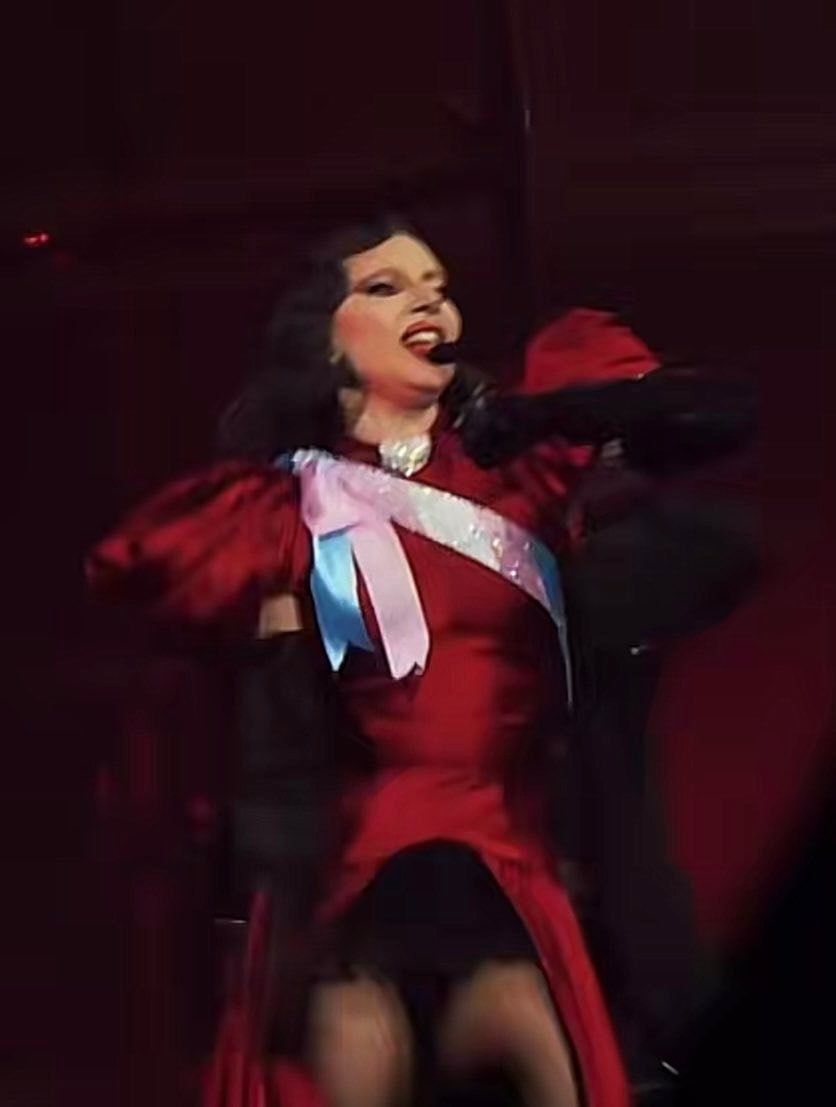 Lady Gaga wore a trans flag as her sash and cape  during the MAYHEM Ball tonight in LA.