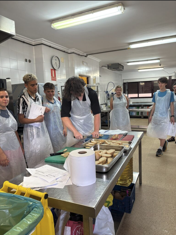 CCSU's tweet photo. Our study abroad students in Salamanca are whipping up more than meals—they’re getting a true taste of Spanish culture! From simmering sauces to stirring up new skills, the kitchen is proving to be just as enriching as the classroom💙🔱🇪🇸
#WeAreCentral #studyabroad #salmanca https://t.co/rf54GQt0gz
