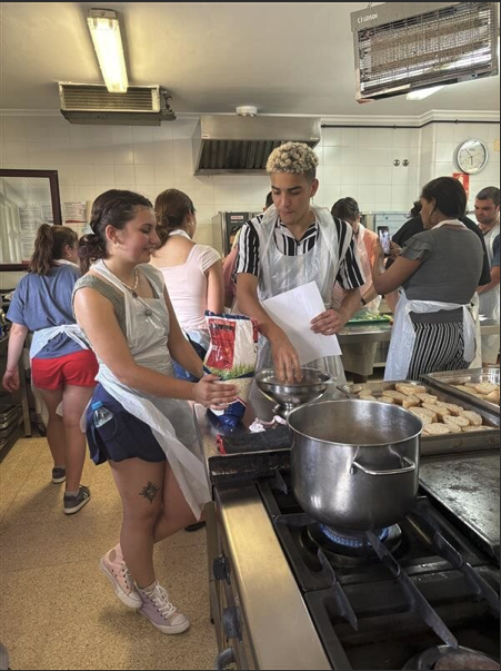 CCSU's tweet photo. Our study abroad students in Salamanca are whipping up more than meals—they’re getting a true taste of Spanish culture! From simmering sauces to stirring up new skills, the kitchen is proving to be just as enriching as the classroom💙🔱🇪🇸
#WeAreCentral #studyabroad #salmanca https://t.co/rf54GQt0gz