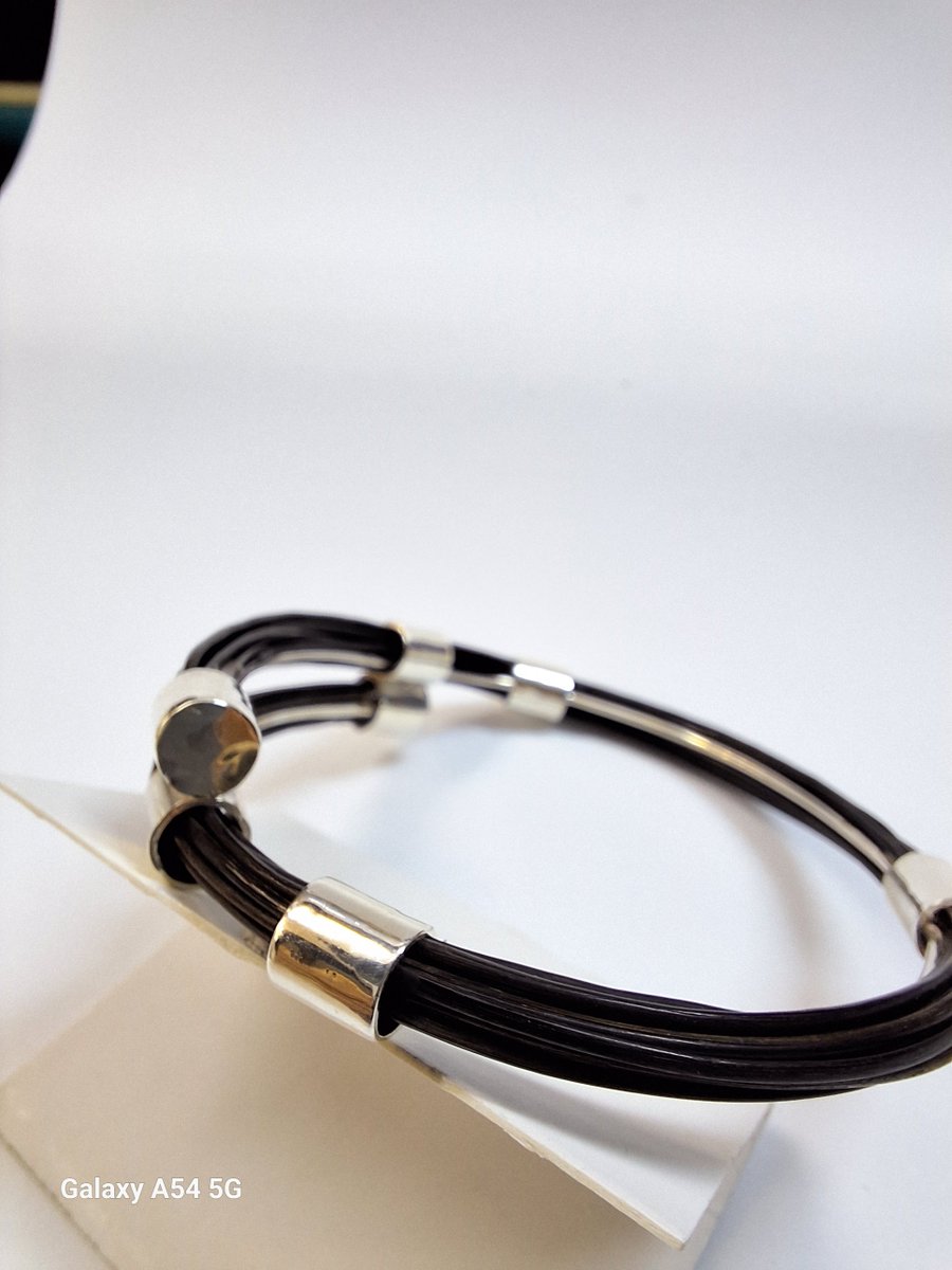 Silver elephant hair bypass bangle. capediamondexchange.com/products/3-bar…