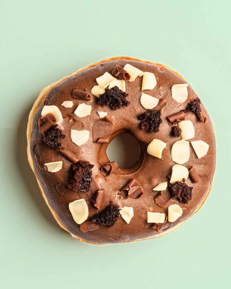 Attention all chocolate lovers!

We'd like to introduce you to Brownie Town 🤎🍫

A ring doughnut coated in chocolate icing, sprinkled with milk &amp; white chocolate curls and finished with a sprinkle of brownie pieces.
.
.
.
#PlanetDoughnut #ChocolateLover