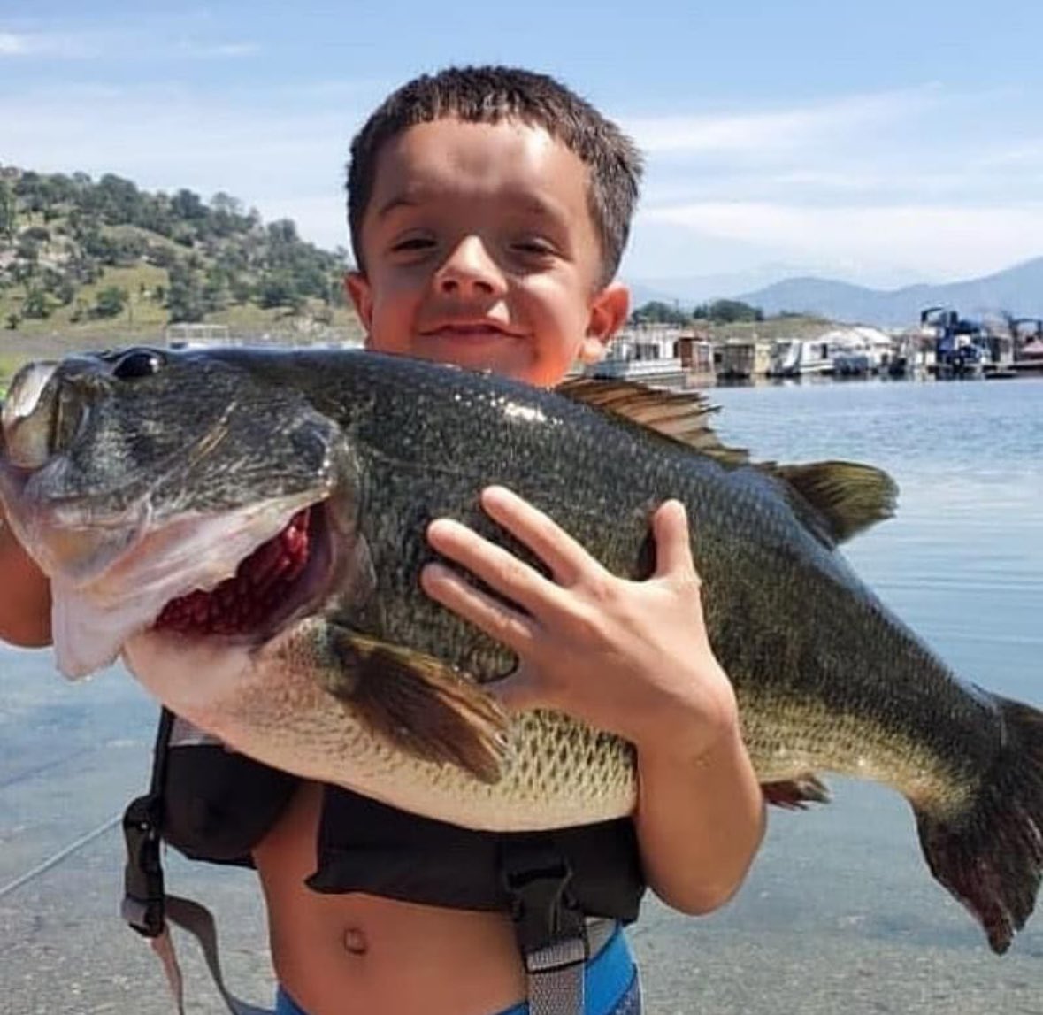Big fish happy kid