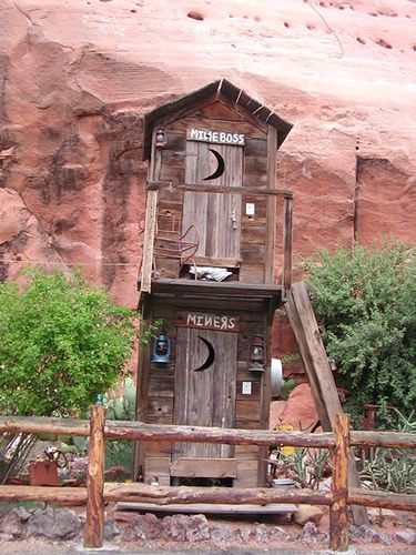Double decker outhouse.