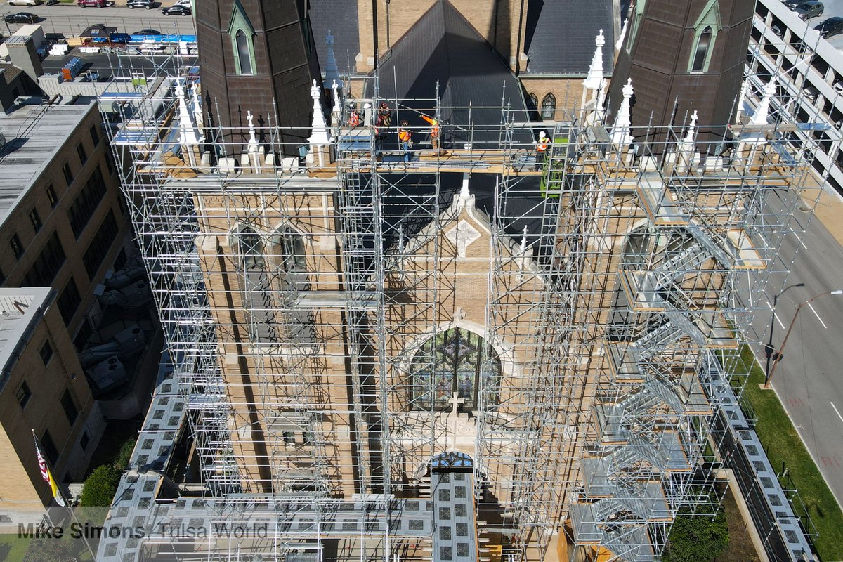 The Father’s Day windstorm of 2023 left significant damage to the Holy Family Cathedral's three spires and its lower roof. A new copper roof is being installed, with that work expected to conclude in December. tulsaworld.com/news/collectio… . #tulsa #catholic #cathedral