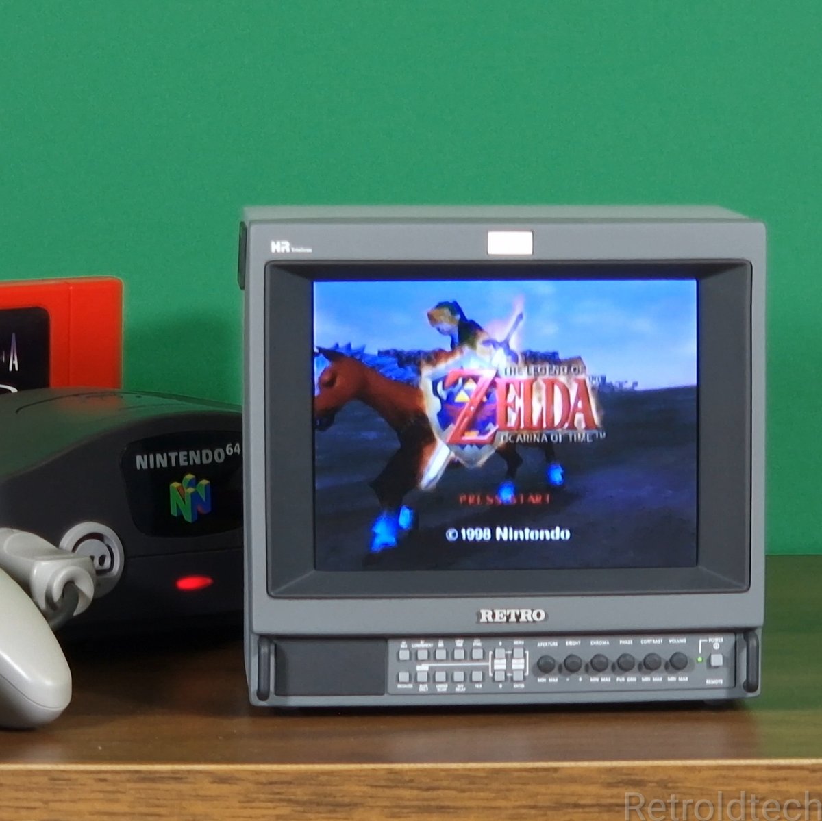 Retroldtech's tweet image. You&apos;re now hearing that title screen music in your head right now 😊

N64 + Ocarina of Time + Mini PVM classic gray,  the triforce of childhood.
#MiniPVM #Retroldtech #N64Vibes #OcarinaOfTime #ZeldaFeels #4by3Forever #RetrogamingSetup #CompactMonitor #PVM