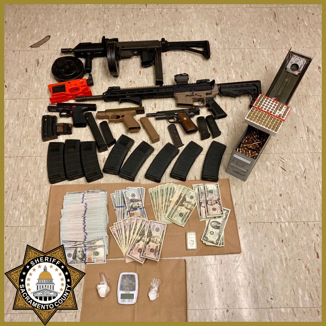 sacsheriff's tweet photo. DRUG DEALER IN ORANGEVALE ARRESTED WITH MULTIPLE ILLEGAL FIREARMS AND NEARLY $35000 IN CASH

Deputies from the Sheriff’s North Division High Impact Policing (HIP) team investigated a known drug dealer in the Orangevale area. The suspect was located and arrested at a local park in possession of fentanyl, methamphetamine, cash, and a digital scale. 

Deputies executed a search warrant at the suspect’s residence, which led to the discovery of two illegally possessed rifles, an unserialized Polymer80 handgun (often referred to as a “ghost gun”), an unregistered Colt .45 handgun, an unregistered Glock 19X, multiple loaded magazines, various rounds of ammunition, and nearly $35,000 in cash. 

The suspect, 35-year-old Daniel Reed, is a convicted felon prohibited from possessing firearms or ammunition. He was transported to the Sacramento County Main Jail and booked into custody, where he remains ineligible for bail. Reed is scheduled to appear in court tomorrow (July 30). 

Reed’s booking photo is prohibited from being posted due to California law.