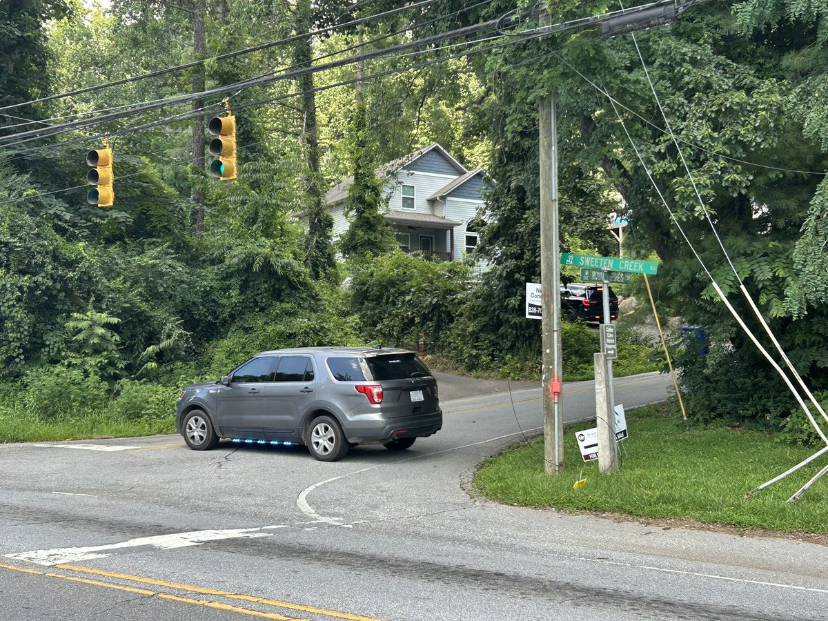 Massive response from Buncombe County Sheriff’s Office on Sweeten Creek and Royal Pines. All we know is they were responding to an active B&amp;E at 12:55. Avoid the area. <a href="/WLOS_13/">WLOS</a>