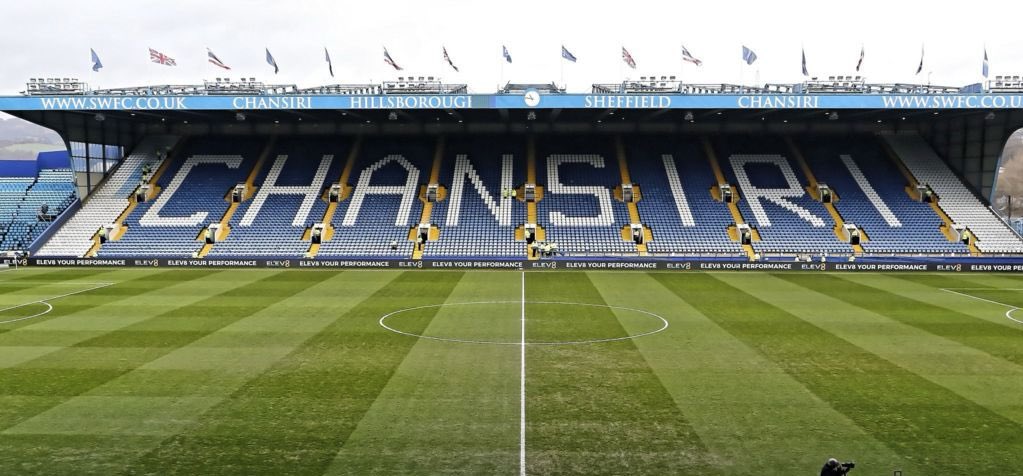 _Bands_FC's tweet image. Sheffield Wednesday have shared their first team squad photo - in front of the stand they can’t use, bearing the name of the chairman who is driving the club into oblivion