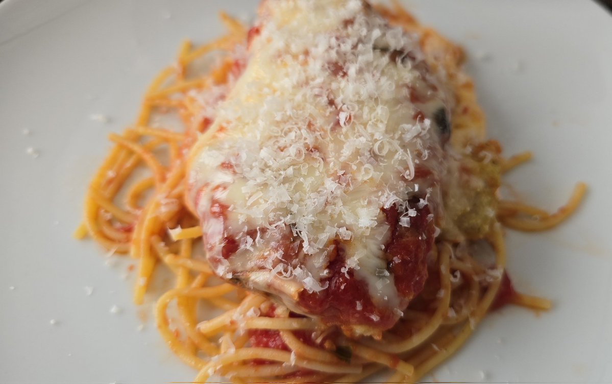 No tacos for us tonight since we had taco salad yesterday.
We had chicken parmesan. I'm not a big fan of chicken but my husband and son love it.