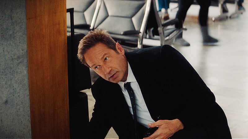 gestureland's tweet image. the symbolism of him unplugging a billboard with an advertisement for generic rom com and then spotting willa in the reflection. BRILLIANT.